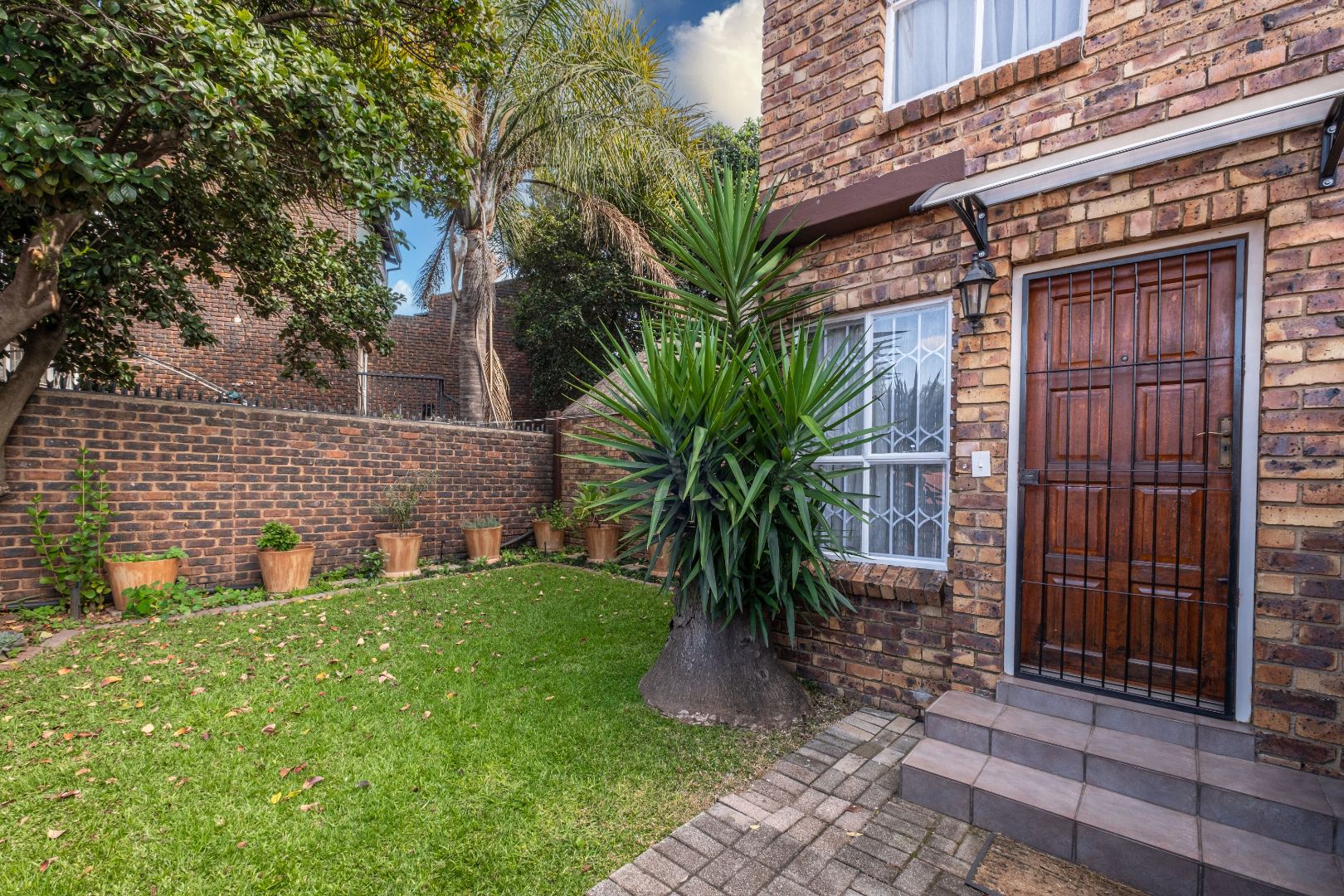 3 Bedroom Townhouse For Sale in Monument Park RE/MAX™ of Southern Africa