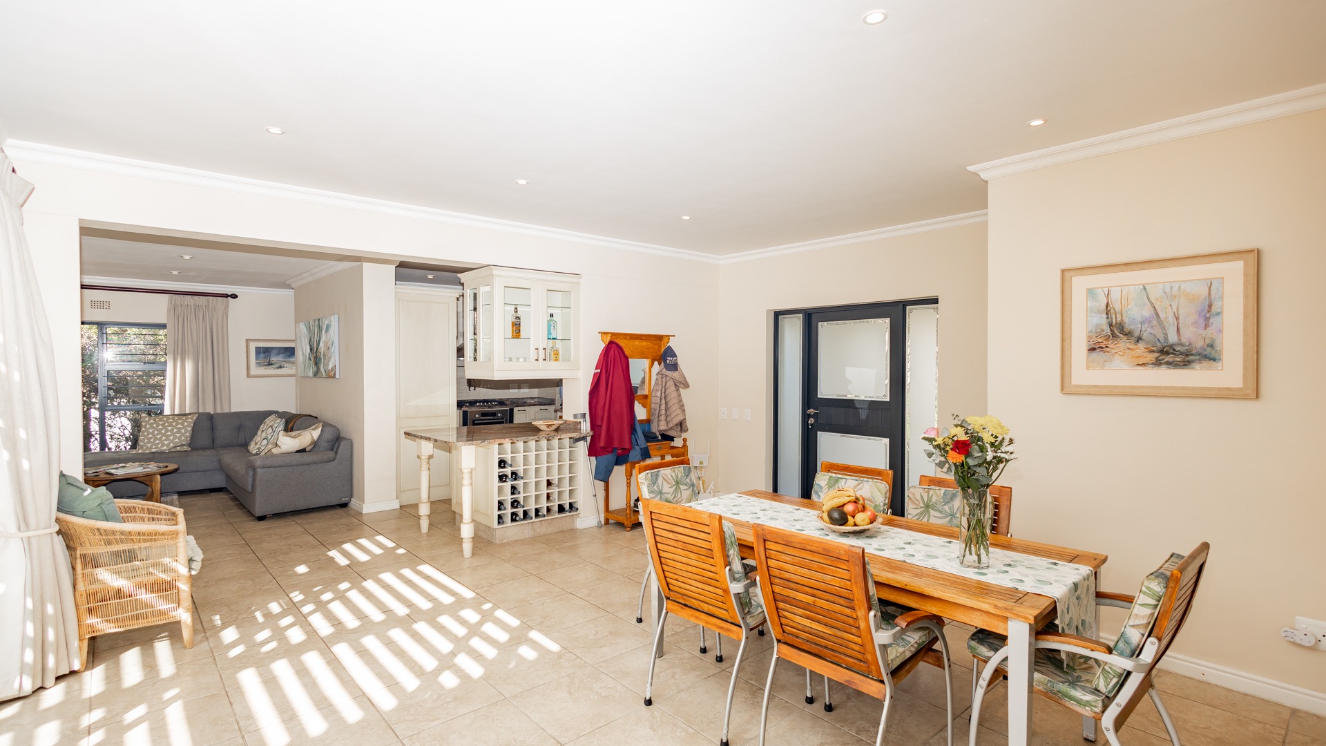Entrance to home and open plan dining area