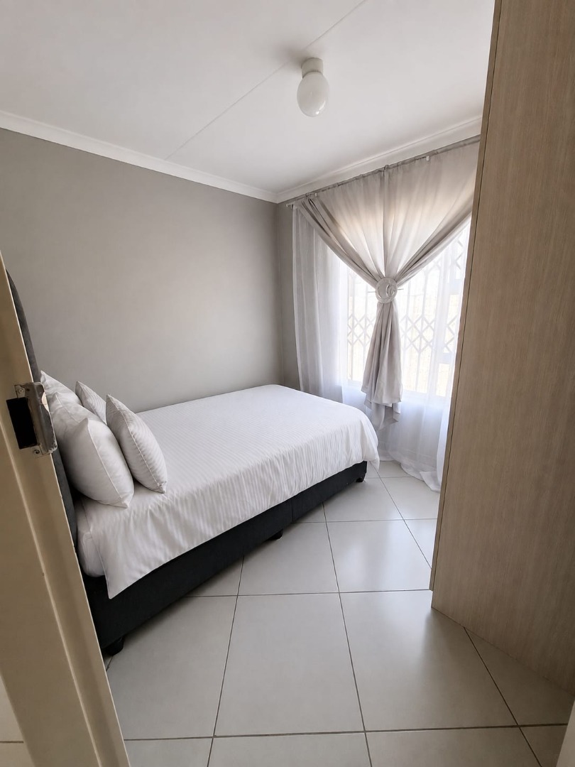 Bedroom 2 , built in cupboards