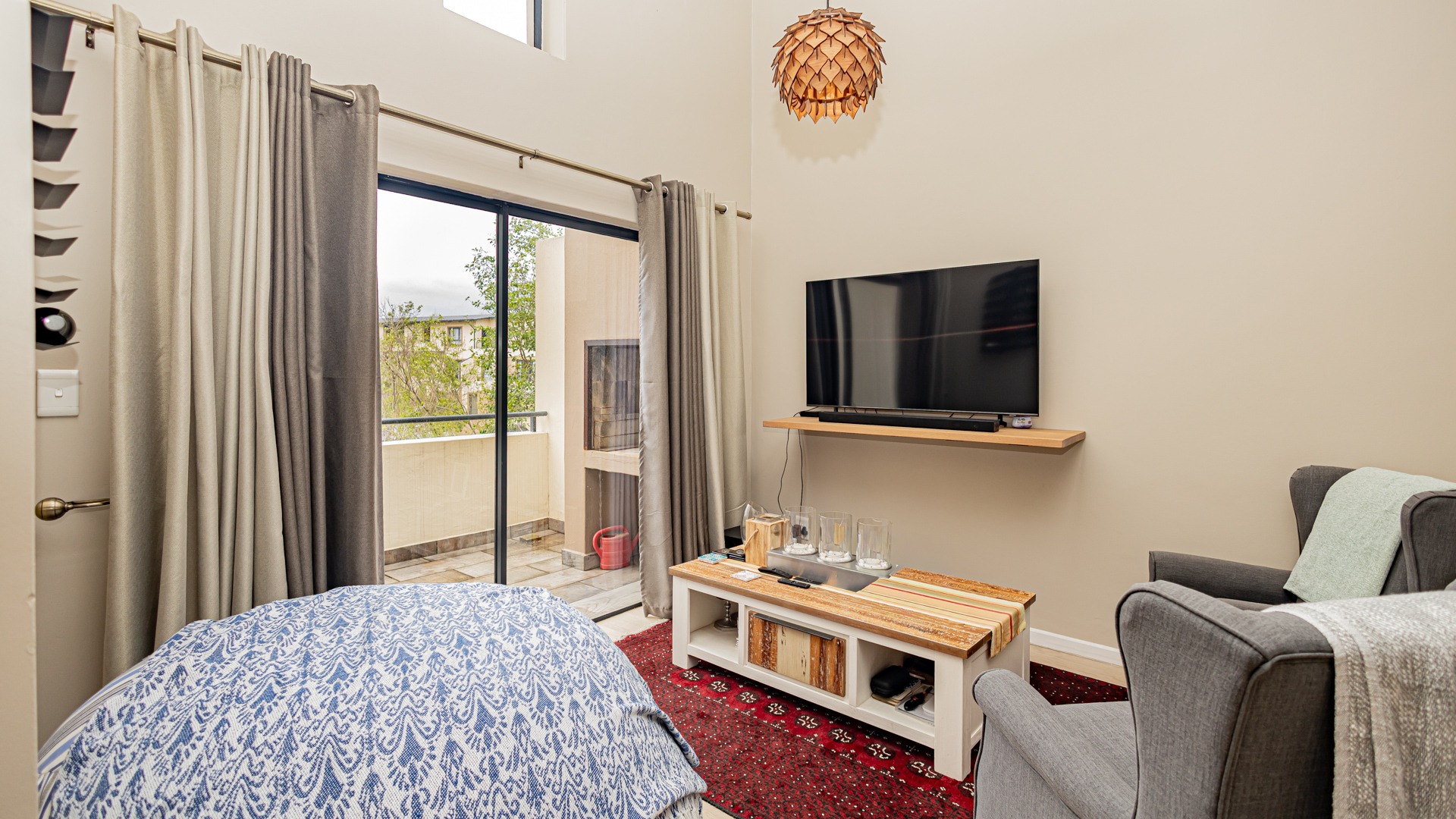 Balcony with braai off living area