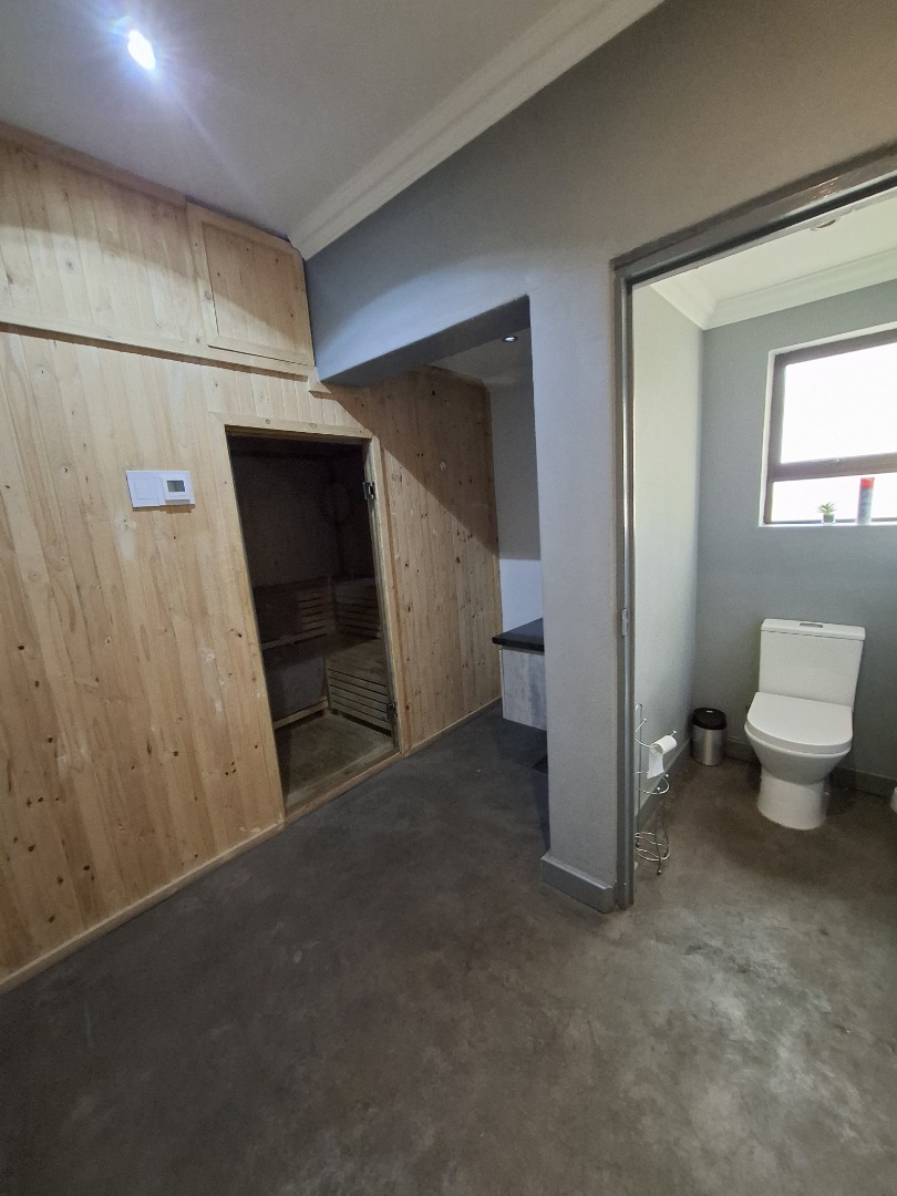 Sauna room with toilet
